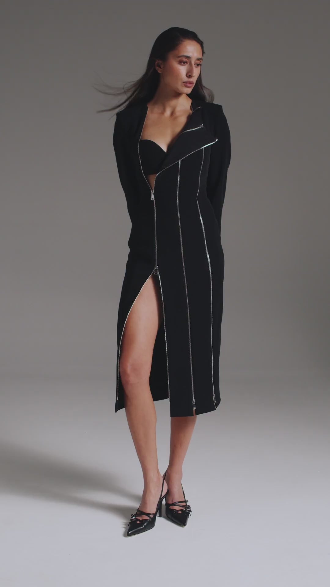 Woman in long elegant dress with slits 